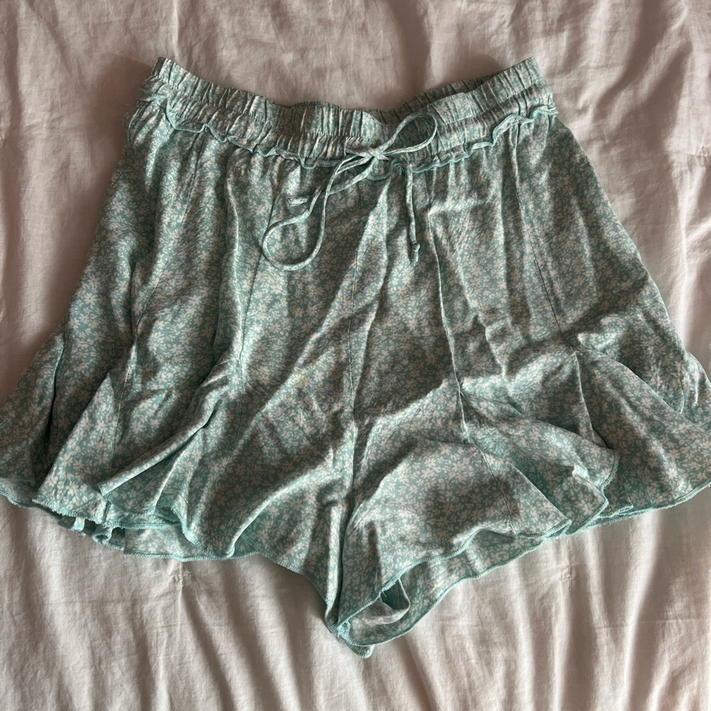 Green and white flowy floral shorts